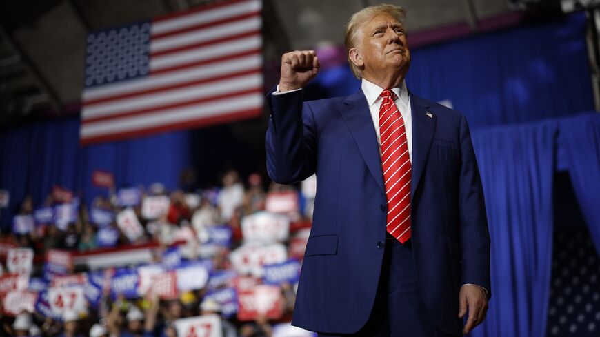 Republican presidential nominee, former US President Donald Trump, takes the stage during a campaign rally in the 1st Summit Arena at the Cambria County War Memorial on August 30, 2024, in Johnstown, Pennsylvania.